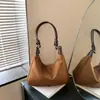 Bolsa Feminina Elegante Versátil Cor Sólida 2026 Nova Estilosa Retrô Grande Capacidade Moda Nicho Personalidade Bolsa Tote de Ombro