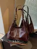 Bolso de mano para mujer 2026 nuevo simple color liso nicho retro versátil diario para ir al trabajo tote bandolera