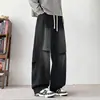 Vibe de rua americana jeans retrô desgastado para homens, estação outono, caimento solto, cor sólida, corte reto, levemente alargado, modelador, calça longa moderna