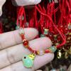 Pulsera nueva hecha a mano de imitación jade cuentas verdes año del conejo colgante de conejo cuerda de mano para estudiante niña tienda de 2 yuanes