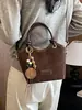 Yuezhi 2026 outono inicial nova moda versátil casual simples bolsa transversal para sair, bolsa tipo balde versátil, bolsa pequena popular