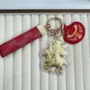 Oro Puro 999, Hazte Rico Inmediatamente, Llavero Dorado del Dios de la Riqueza, Colgante de Bolsillo de Caballo del Zodiaco de Dibujos Animados, Regalo de Año Nuevo