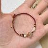 Novo estilo chinês pulseira de osmanthus tecida à mão feminina estilo étnico pulseira com design de lótus simples estilo antigo pulseira estilo frio e claro