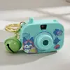 Cámara de simulación de proyección de dibujos animados llavero de moda colgante para bolso de niña pequeña juguete pequeño cuerda para la mano venta al por mayor