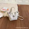 Bolsa feminina de alta qualidade e grande capacidade, novo estilo verão 2026, bolsa saco elegante e moderna, bolsa transversal simples para o dia a dia, bolsa para mãe e filha