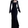Atmósfera Estilo Coreano Principios de Otoño Ropa Popular para Mujer 2025 Nuevo Paso a Paso Vestido de Cola de Pescado Negro Loto Falda Larga