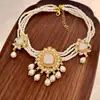 Estilo Palácio vintage vintage pingente gota d'água colar de pérolas multicamadas corrente de clavícula nupcial brincos conjunto colar