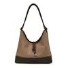 Bolsa Tote Retrô de Camurça Transfronteiriça para Mulheres Outono 2025 Nova Tendência Moda Casual Grande Capacidade Ombro Único Bolsa de Axila