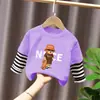 Camiseta de manga larga de algodón puro para niño 2026 primavera y otoño nueva elegante de dibujos animados estilo dos piezas falsas camiseta base de primavera para niño
