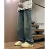 Jeans de retazos desgastados lavados a la calle estilo americano para hombre, primavera y otoño, corte recto holgado, pantalones largos estilo vibra de alta calle europea y americana