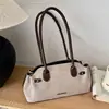 Bolso de mano nuevo de otoño 2026 estilo coreano transfronterizo, bolso de mano de diseño nicho, bolso de hombro versátil y moderno, bolso de axila