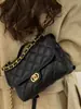 Mochila de Moda Popular Estilo Coreano para Mujer Otoño e Invierno 2025 Nueva Mochila Pequeña Casual Simple Acolchada Bolso con Cadena