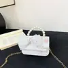 Nueva bolsa para niños bolsa de niña cadena de perlas bolso de mano moda estilo extranjero princesa hombro bandolera monedero