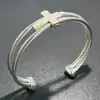 Pulseira de Cabo Torcido em Aço Inoxidável David, Design Único de Luxo de Alto Padrão, Pulseira Aberta, Disponível Exclusivamente na Amazon