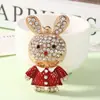 Nuevo colgante de llavero de conejo de dibujos animados con diamantes de imitación transfronterizo, lindo accesorio de bolsa de conejito para mujer, pequeño regalo exquisito