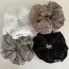 Goma para el pelo tipo scrunchie bordada con encaje estilo coreano, con un tacto de alta gama, presenting un diseño de flor de tela calada para coletas