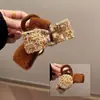 Horquilla para el pelo con lazo de felpa estilo Chanel, estilo femenino, con temperamento en la parte trasera de la cabeza, con forma de tiburón, para otoño e invierno, nueva y de alta gama.