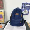 Mochila Escolar Feminina Estudantes do Ensino Fundamental Estudantes do Ensino Médio Mochila de Grande Capacidade Estudantes Universitários Lona Jeans Combina com Tudo Mochila de Viagem Moderna