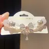 Pulseira de pérolas com laço de zircônia em estilo francês, camada dupla, pulseira de nicho de luxo leve, joias requintadas e simples