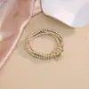 Pulsera de Hebilla de Herradura con Cuentas Doradas Apiladas para Mujer Diseño Ins Pulsera de Corazón Estrella Candado Tendencia Suministro Transfronterizo