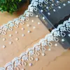 Venta al por mayor de fábrica encaje de punto barato malla bordado accesorios DIY hilo para la cabeza vestido textil para el hogar
