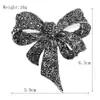 Broche con lazo de aleación de perla negra y diamantes de imitación retro transfronterizos para mujer