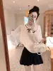 Top de punto con cuello de muñeca y retazos de gasa y seda de hielo para mujer, nuevo estilo Primavera y Otoño 2026, diseño holgado que reduce la edad, manga larga