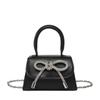 Bolso de Mano con Lazo Bolso Cuadrado Pequeño para Mujer 2026 Primavera Nuevo Bolso de Hombro con Cadena Cruzado de Hombro Bolso de Mujer de Moda y Elegante