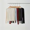 Camiseta feminina de mistura de lã com manga longa e barra relaxada dobrada, nova coleção outono/inverno 2026, caimento justo, valoriza a silhueta, top casual e versátil