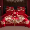 Juego de cuatro piezas de alta gama para boda 60S de algodón de fibra larga en rojo brillante con bordado de algodón puro para recién casados