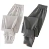 Calças de outono de algodão puro para crianças, calças térmicas de algodão de cor sólida para meninos e meninas, leggings listrados de algodão A-class para crianças de tamanho médio e grande, calças de dormir para casa
