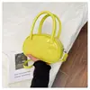 Bolsa de mão lisa estilo coreano para mulheres, nova moda verão 2026, bolsa concha estilosa e requintada, bolsa transversal casual da moda