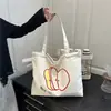 Nueva Bolsa de Lona con Cordón para Estudiantes 2025, Simple y Ligera, Bolso Tote de Gran Capacidad, Bolso de Hombro Versátil para el Viaje Diario