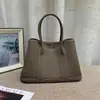 Bolsa Transfronteiriça de Couro Genuíno Bolsa de Mão Versátil Couro Bovino de Camada Superior Togo Bolsa de Trabalho para o Dia a Dia Bolsa Feminina Transversal Casual Versátil