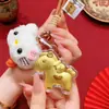Año del Caballo Caballo Rico Llavero Colgante Caballo Dorado Cadena para Bolso de Teléfono Regalo Creativo Colgante de Caballo de Dibujos Animados Venta al por Mayor
