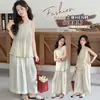 Conjunto Elegante de Chaleco sin Mangas y Pantalón de Pierna Ancha para Niña Verano 2026 Atuendo de Verano para Niña Grande Estilo Vacacional Conjunto de Dos Piezas