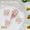 Nuevas joyas para uñas al por mayor lazo brillante hueco ojo de gato tridimensional combinan con todo para usar accesorios de decoración de uñas