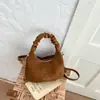 Bolso pequeño cuadrado simple de alto valor 2026 nuevo estilo versión coreana bolso de axila sensación relajada moderno bolso de un solo hombro bolso cruzado casual