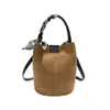Bolso de Mano para el Trabajo 2025 Nuevo Estilo Bolso Cubo Simple y de Moda Bolso de Hombro Versátil Bolso de Atmósfera de Alta Gama para Mujer