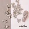 Nuevas Explosiones Accesorios para Uñas Usar Uñas Uñas Aleación Hueco Mini Tridimensional Mariposa Lazo Joyería Fábrica