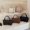 Bolso almohada de nicho moderno estilo coreano para mujer, nuevo modelo otoño 2026, bolso cuadrado pequeño simple con sensación de calidad, adecuado para el uso diario, bolso cruzado