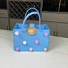 Bolsa de fieltro al por mayor Bola de fieltro Dibujo animado Regalo acompañante Bolso de mano de fieltro Bolsa de compras para llevar a mano Bolsa de regalo logo