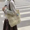 Bolsa de playa tejida hueca con estrella de mar y concha para mujer 2026 Nueva bolsa de hombro de paja de gran capacidad