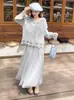 Nueva Colección Otoño/Invierno 2026: Cárdigan de punto floral tridimensional + falda de punto de malla patchwork, un elegante conjunto de dos piezas para mujer