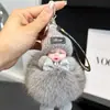 Colgante de bola de pelo de zorro real muñeca de peluche linda muñeca durmiendo llavero para coche de bebé adornos para bolso