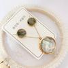 Set de Collar y Pendientes de Acero de Titanio de Alta Calidad, Nuevo Estilo Europeo y Americano, de Venta Caliente Transfronteriza, Joyería de Concha Genuina para Mujer, Precio Especial, Entrega Directa