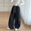 Calça de Moletom Feminina Primavera e Outono 2026 Nova Casual Estilo Coreano Calça de Perna Larga Tricotada para Crianças Maiores Roupa Infantil Transfronteiriça