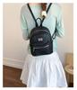 Mochila Pequena Nova de Verão 2026 Moda Versátil Bolsa de Mão para Mulheres Design de Nicho para Exterior Mochila com Padrão de Lichia Tendência