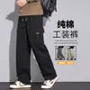 Calça de trabalho masculina de algodão estilo americano para o outono, apresentando um design retrô, minimalista e sofisticado com múltiplos bolsos e corte reto para um visual casual.