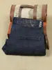 Jeans de alta gama para hombre para primavera y verano, corte slim recto, azul oscuro, pantalones de mezclilla elásticos para negocios casuales